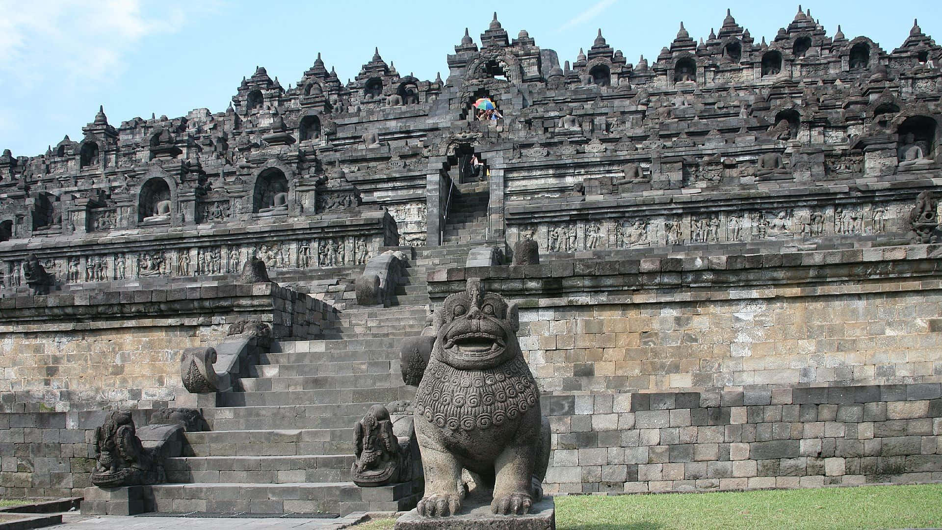 Borobudur Temple On Top Of The Mountain Background