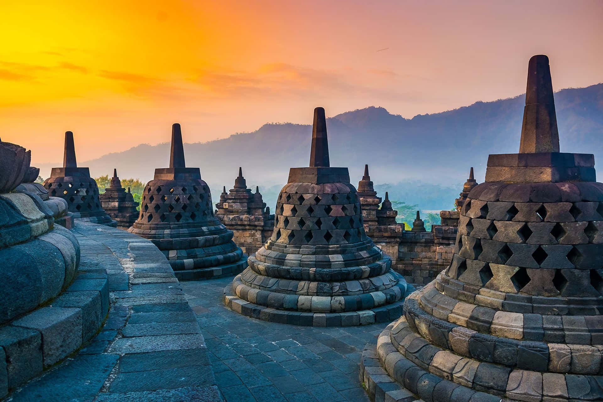 Borobudur Temple Under Orange Sky Background
