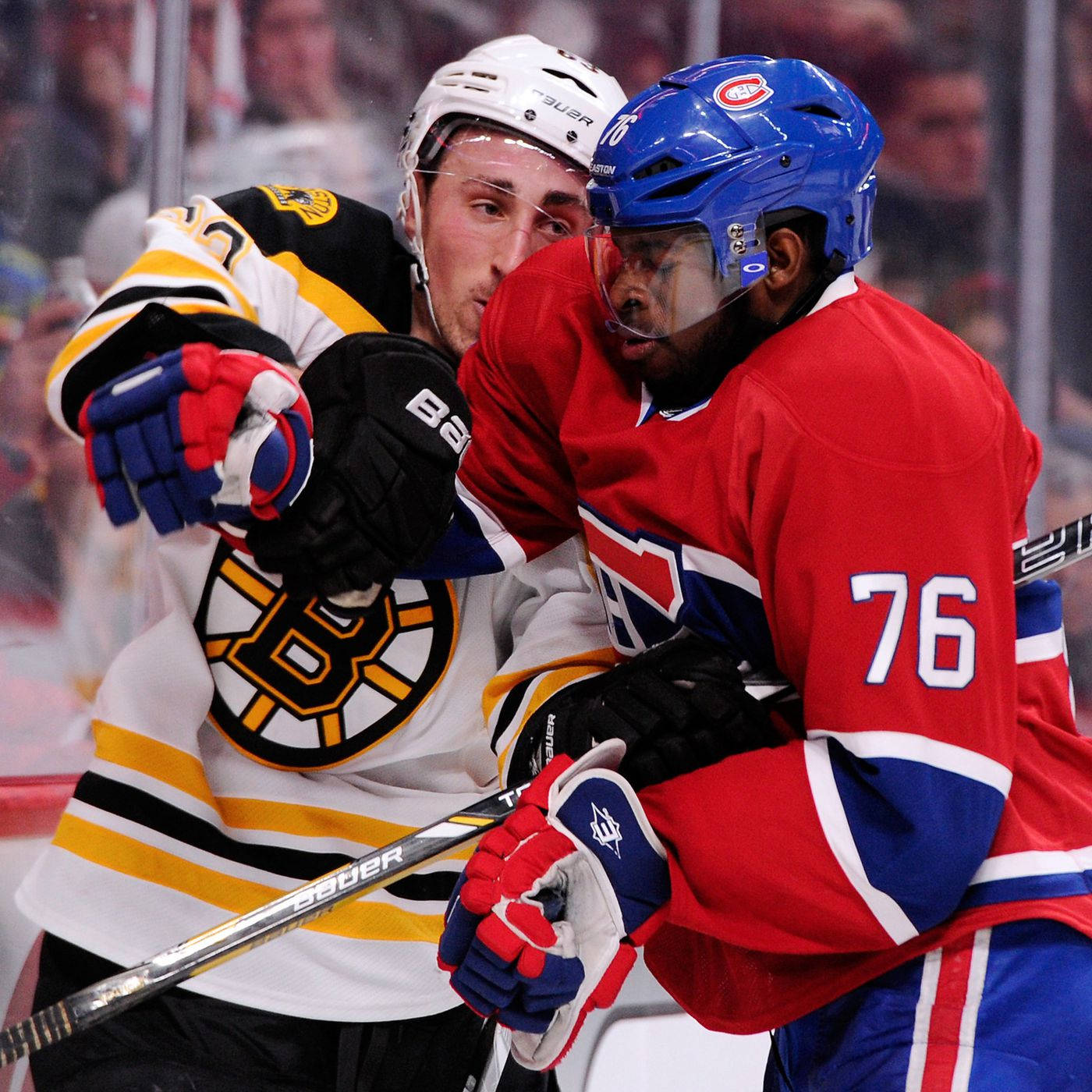 Boston Bruins Forward Brad Marchand In A Face-off Against P.k. Subban. Background