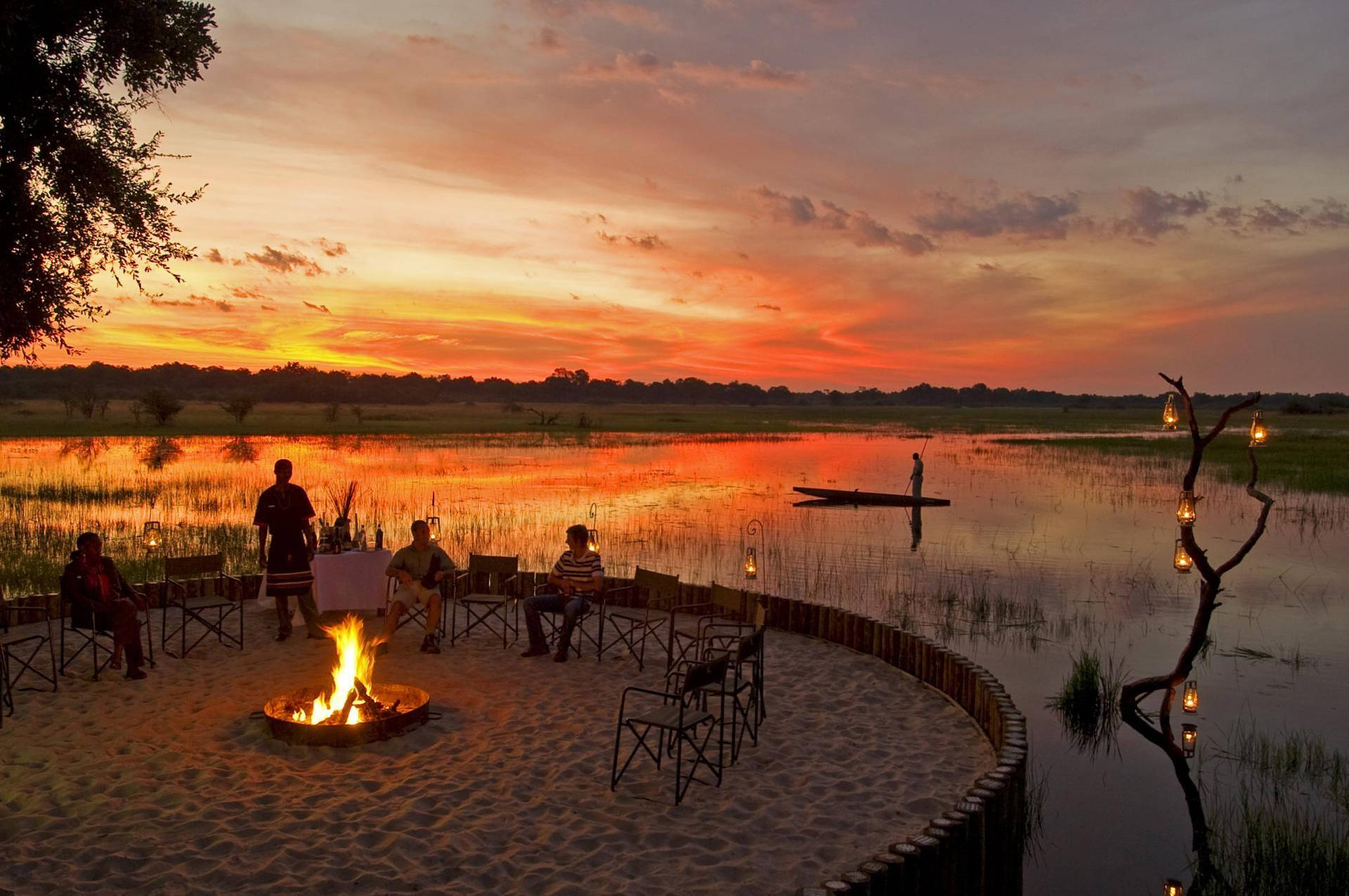 Botswana Bonfire At Sunset Background