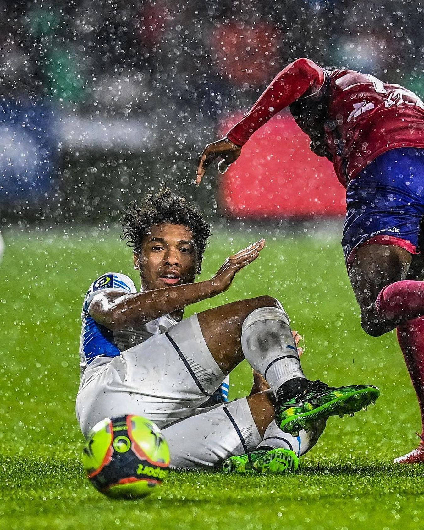 Boubacar Kamara Battling The Rain On The Football Field