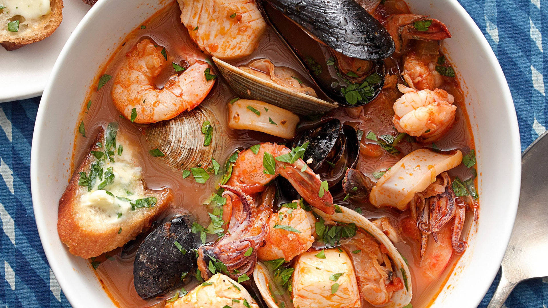 Bouillabaisse French Dish With Bread Background