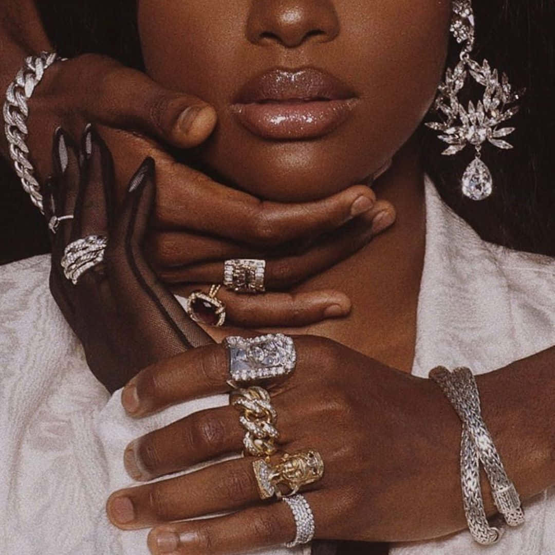 Boujee Aesthetic Girl Caressed With Jewels Background