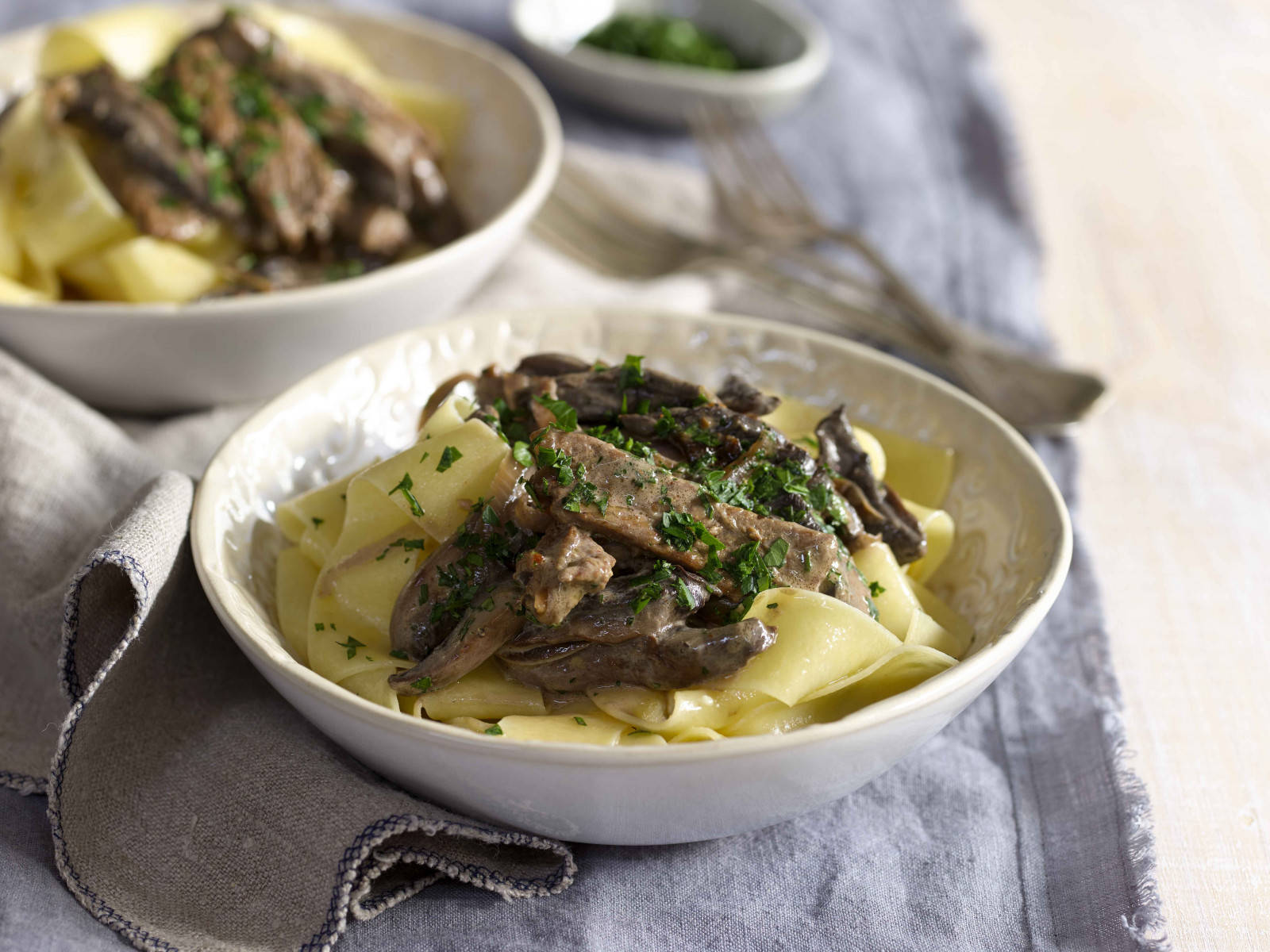 Bowl Of Beef Stroganoff And Pappardelle Pasta Background