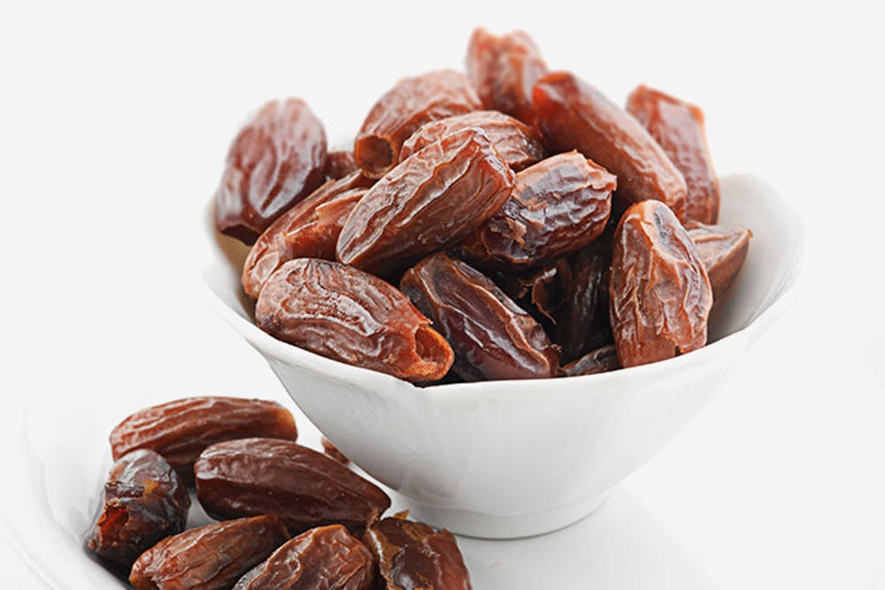 Bowl Of Dates Fruits Background