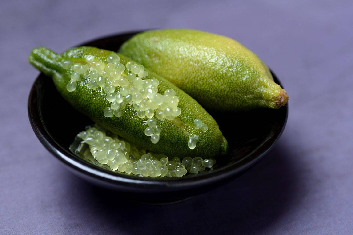 Bowl Of Finger Limes: Nature's Citrus Caviar Background