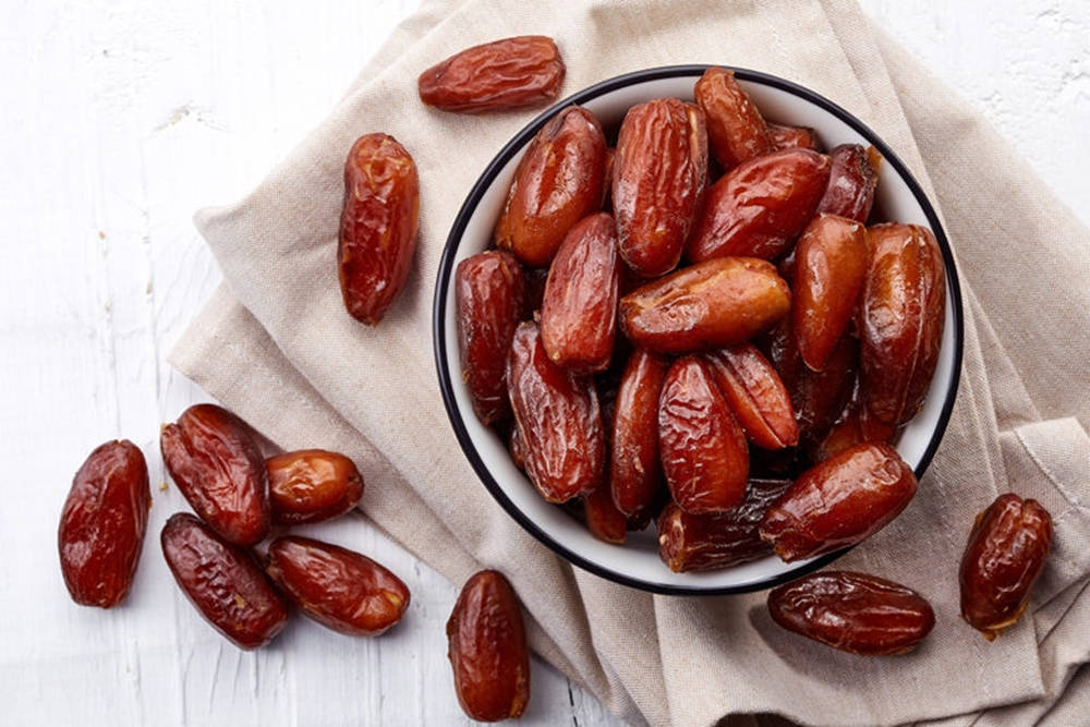 Bowl Of Red Dates Background