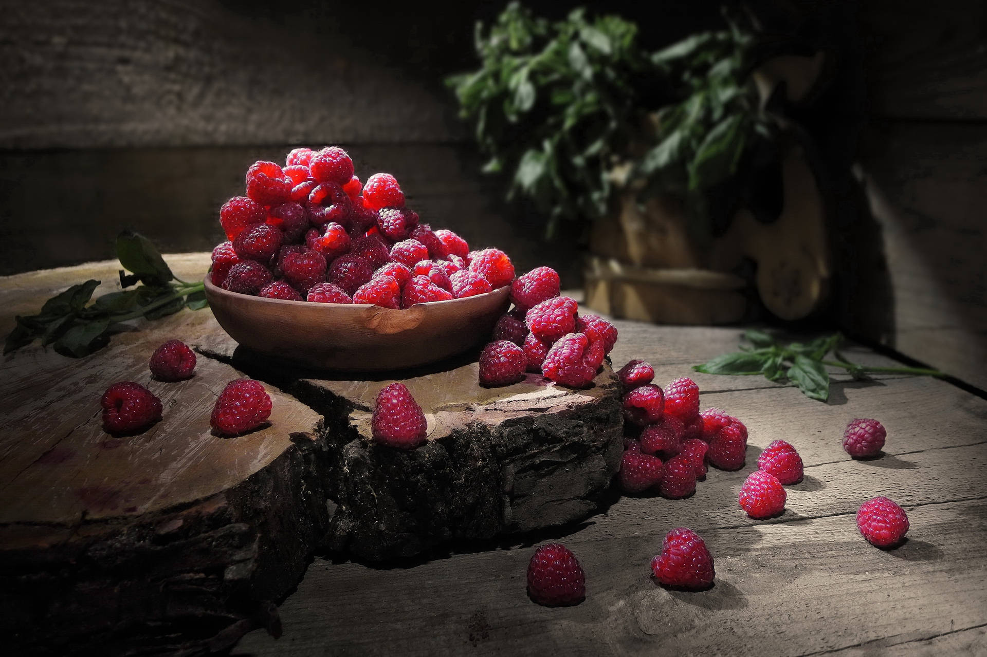 Bowl Of Spilled Raspberries Background