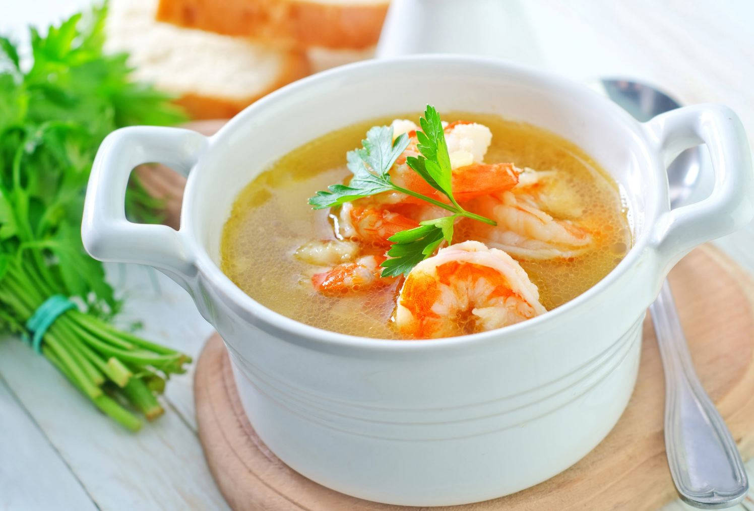 Bowl Of Tom Yum Soup With Parsley Background