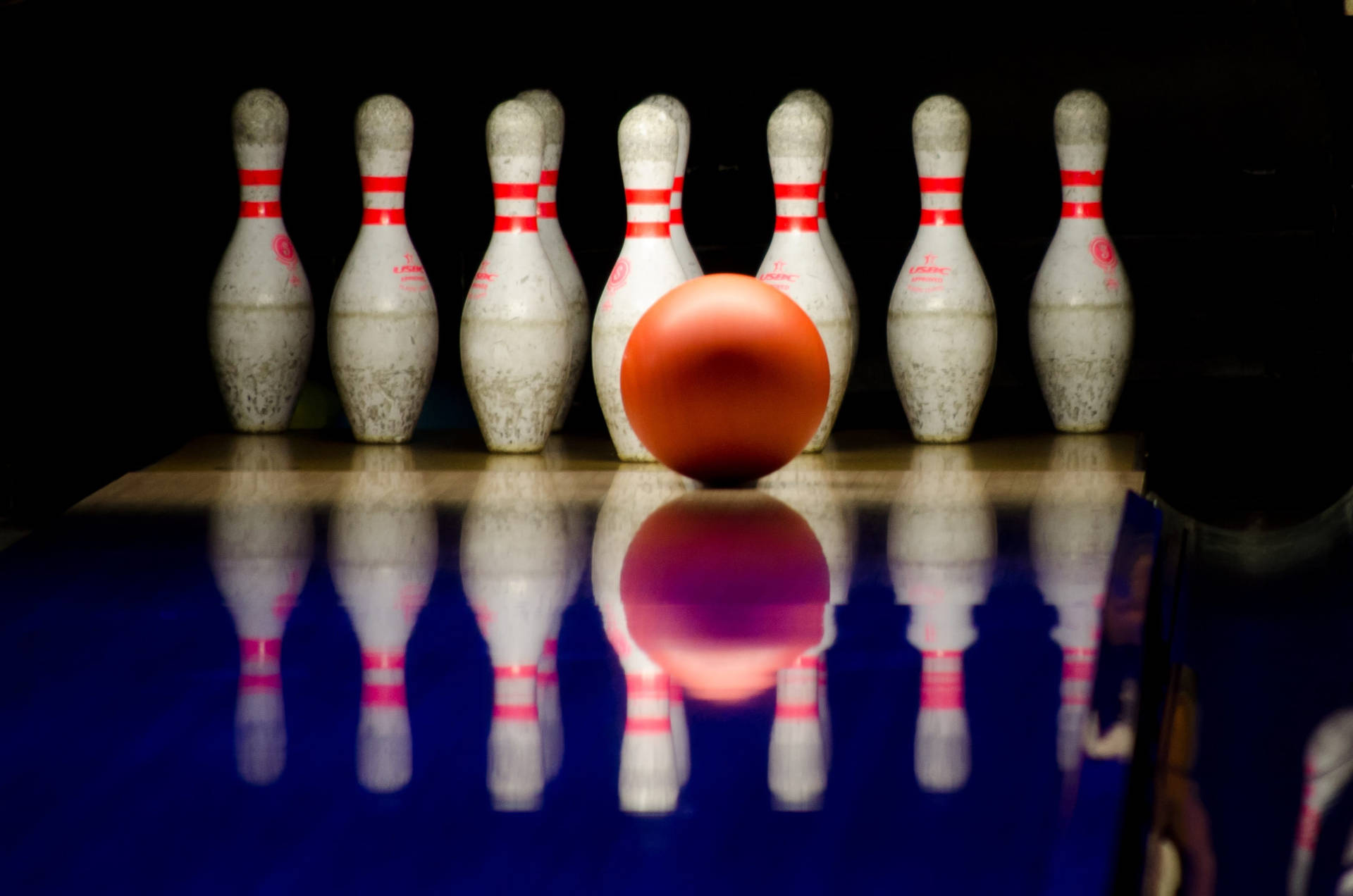 Bowling Ball And Dirty Pins Background