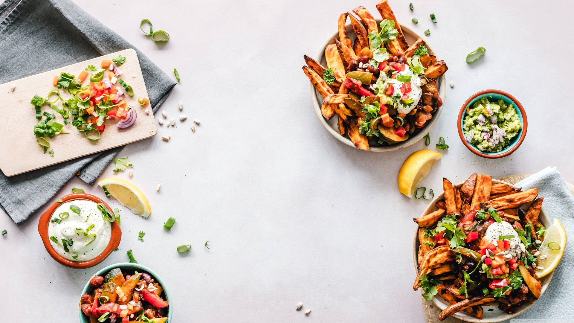 Bowls Of Finger Foods In White Table Background