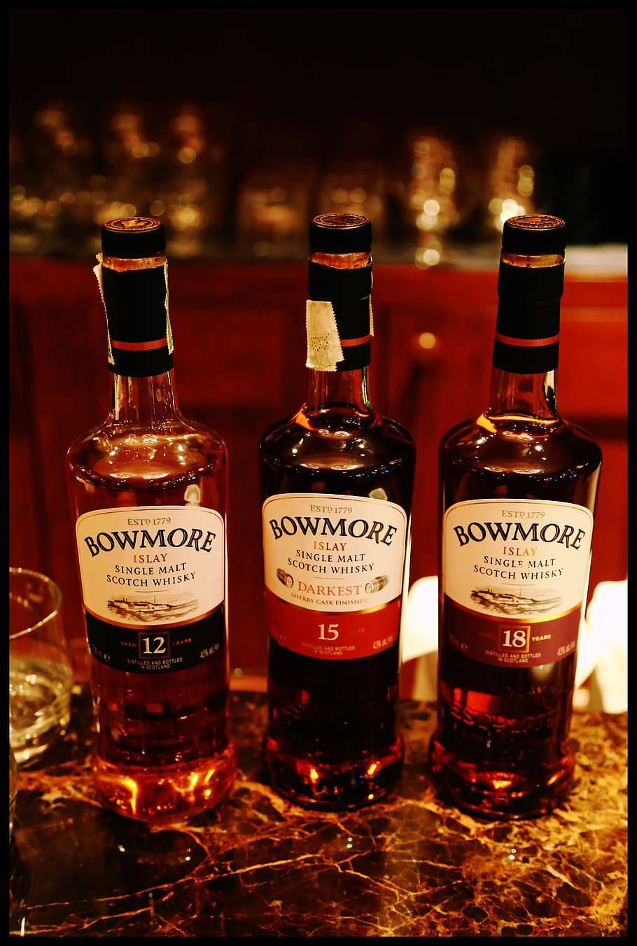 Bowmore 12 15 Darkest 18 Years Old Whisky Collection Background