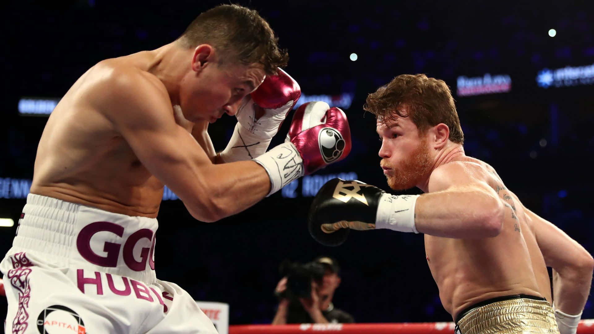 Boxing Champion Saul 'canelo' Alvarez Lands A Powerful Punch Background