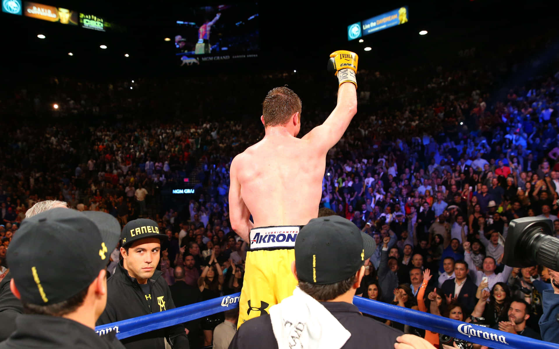 Boxing Champion Saul 'canelo' Alvarez With Admirers Background