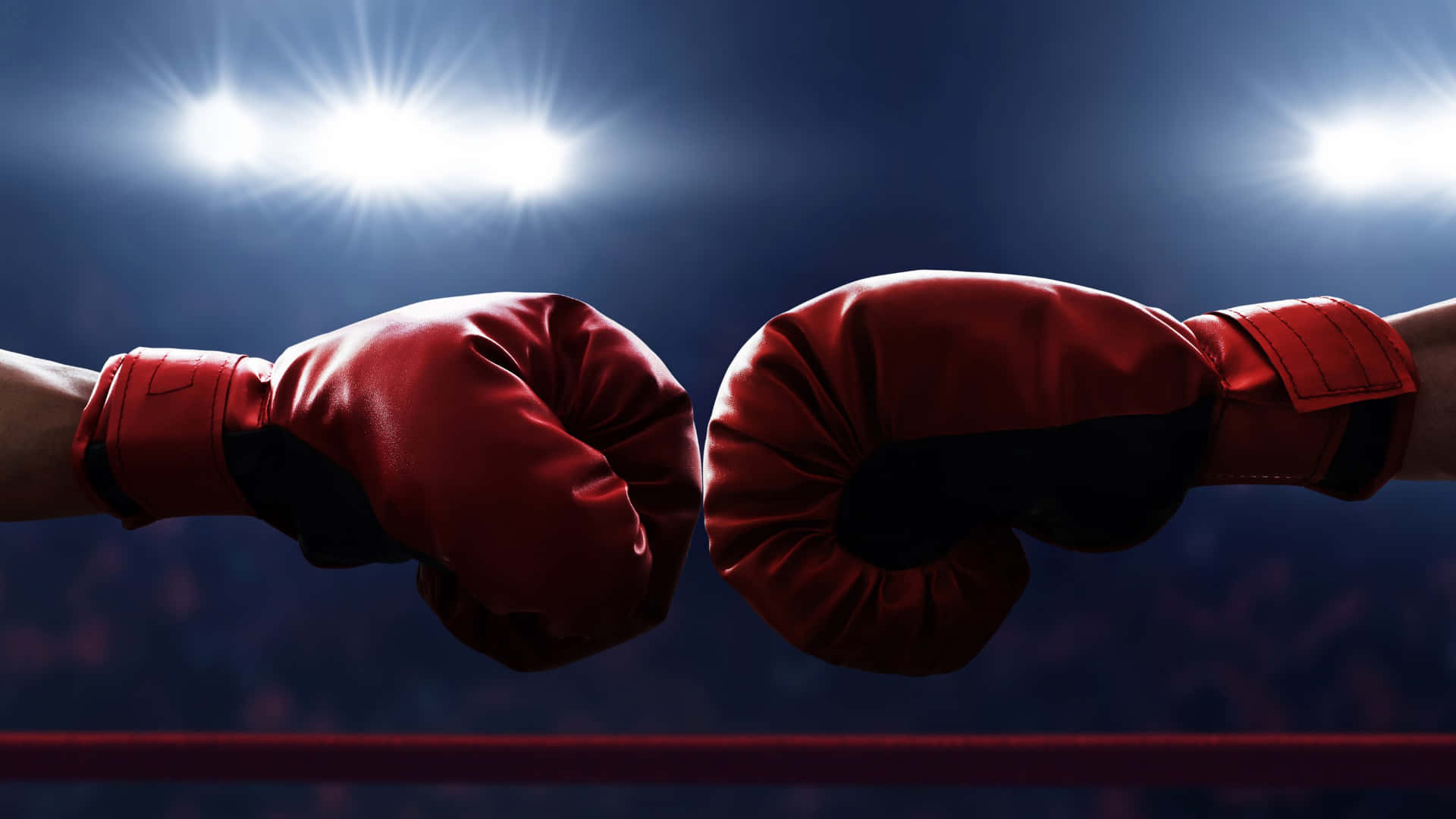 Boxing Gloves Fist Bump Under Spotlight Background