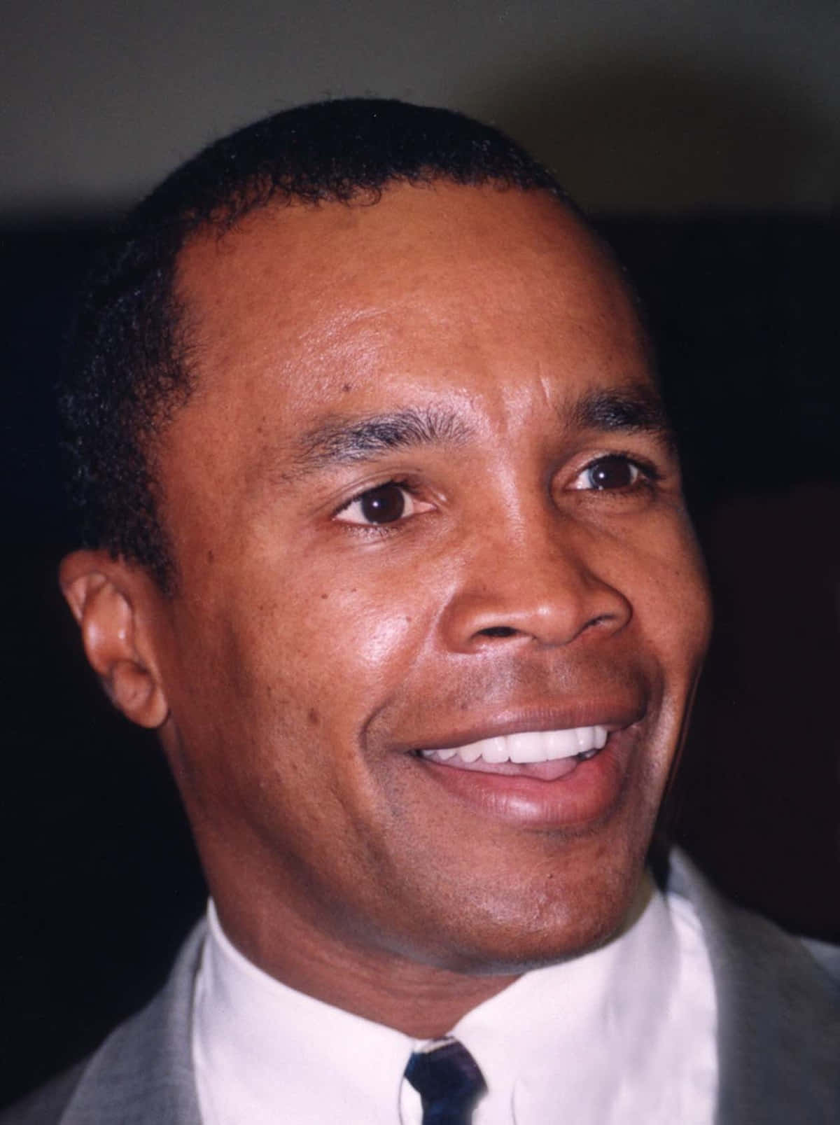Boxing Legend Ray Leonard Dazzles In A Suit Background