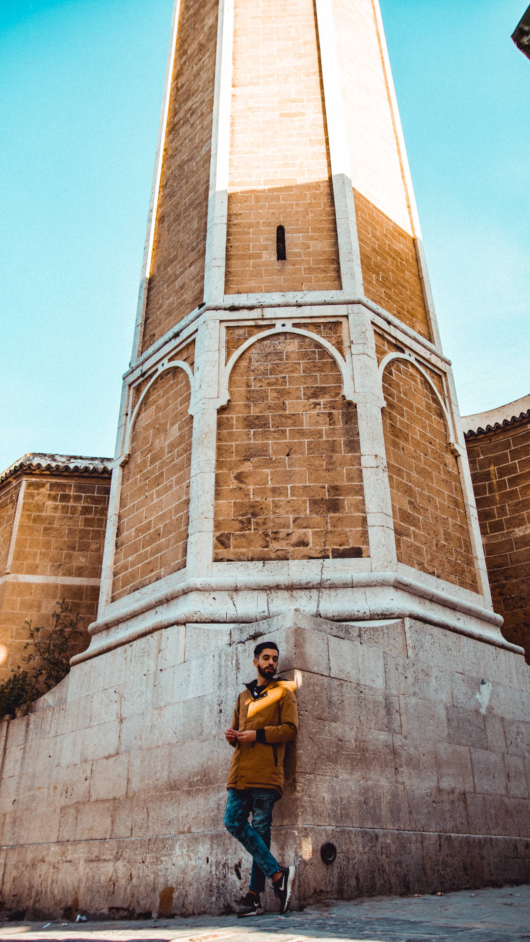Boy And Tower In Tunisia Background
