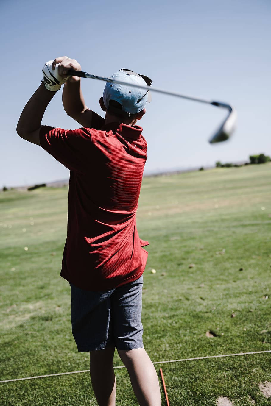 Boy Playing Golf Phone Background