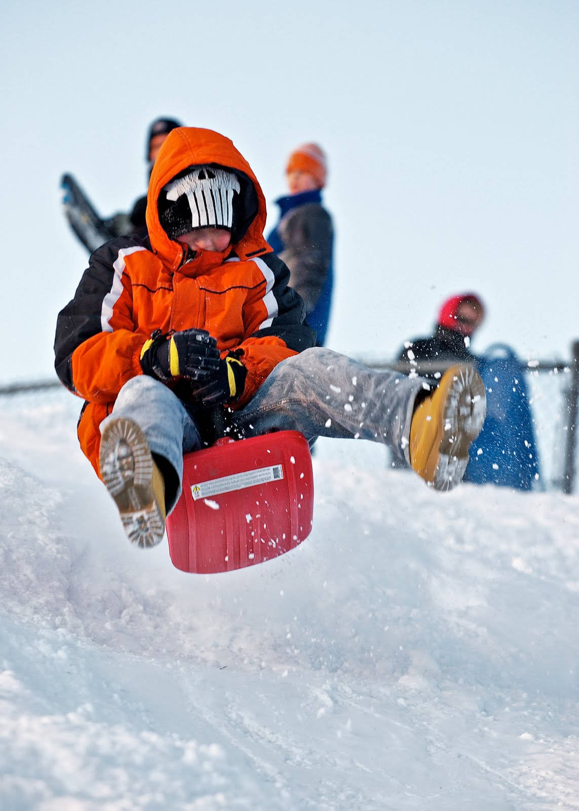 Boy Sledding Jumped Background