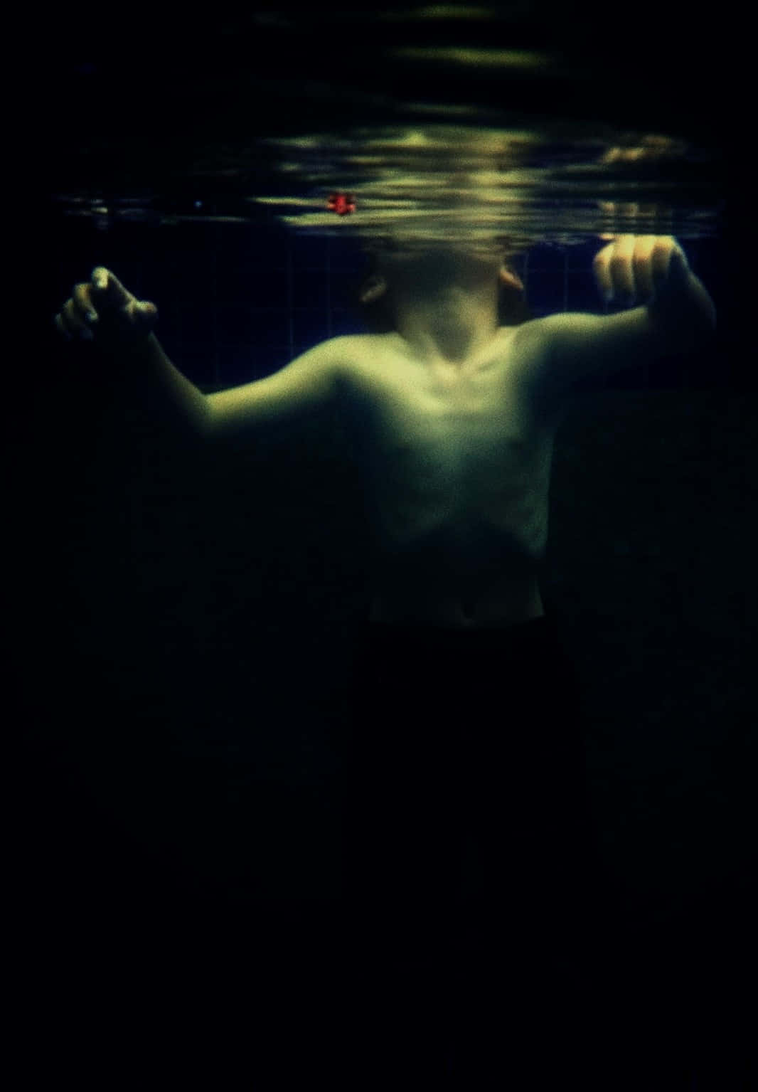 Boy Swimming Underwater Iphone Background