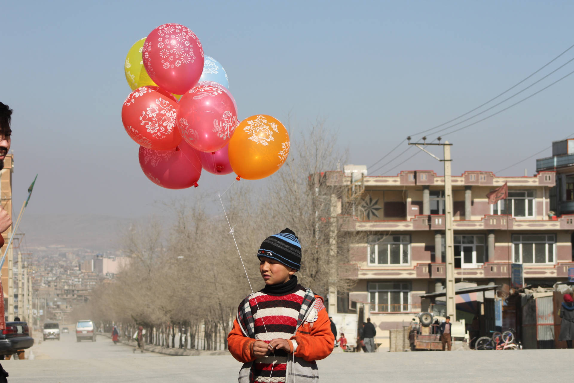 Boy With Balloons Kabul Background