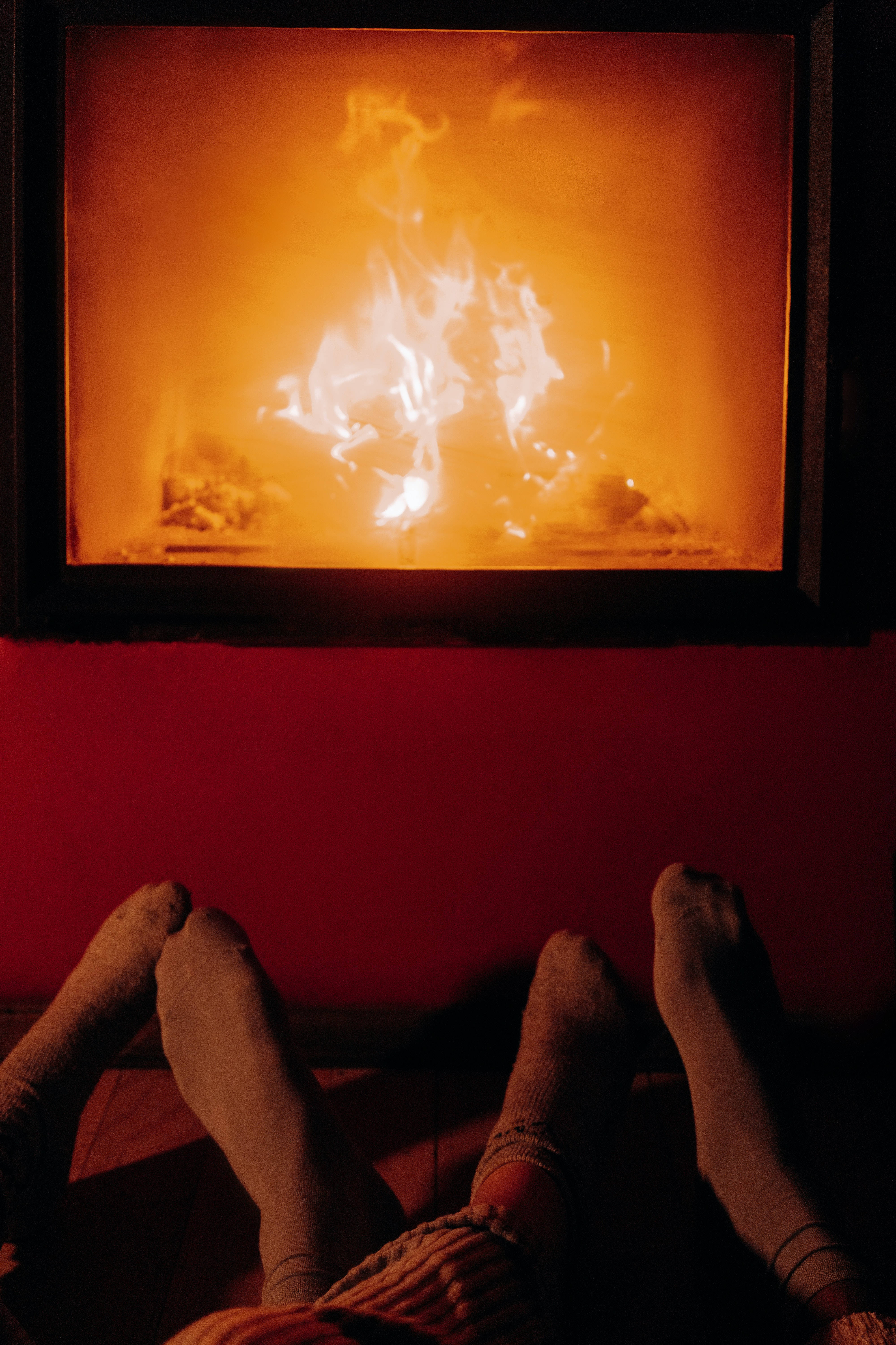 Boyfriend And Girlfriend By The Fireplace Background