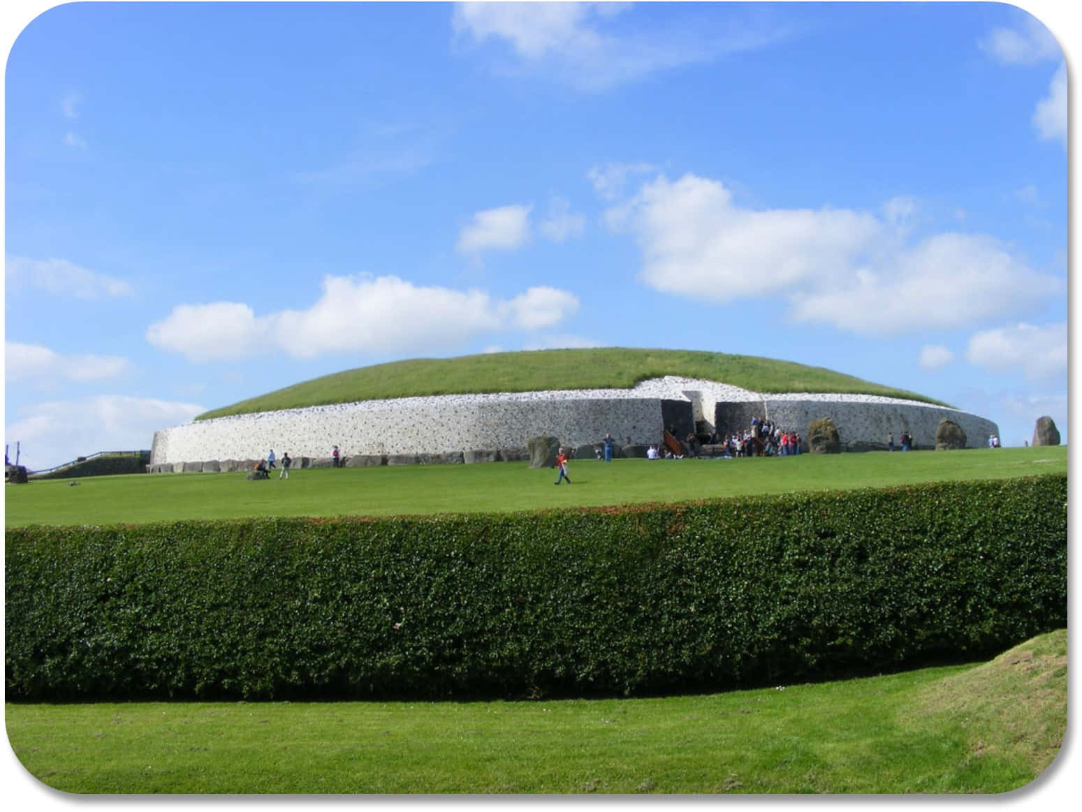 Boyne Valley Newgrange With Grass And Blue Sky Background