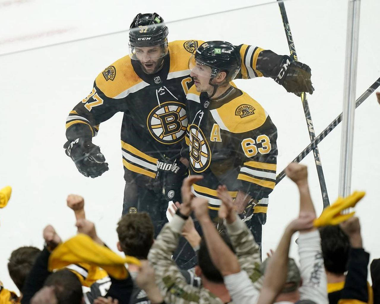 Brad Marchand And Patrice Bergeron Celebration Background