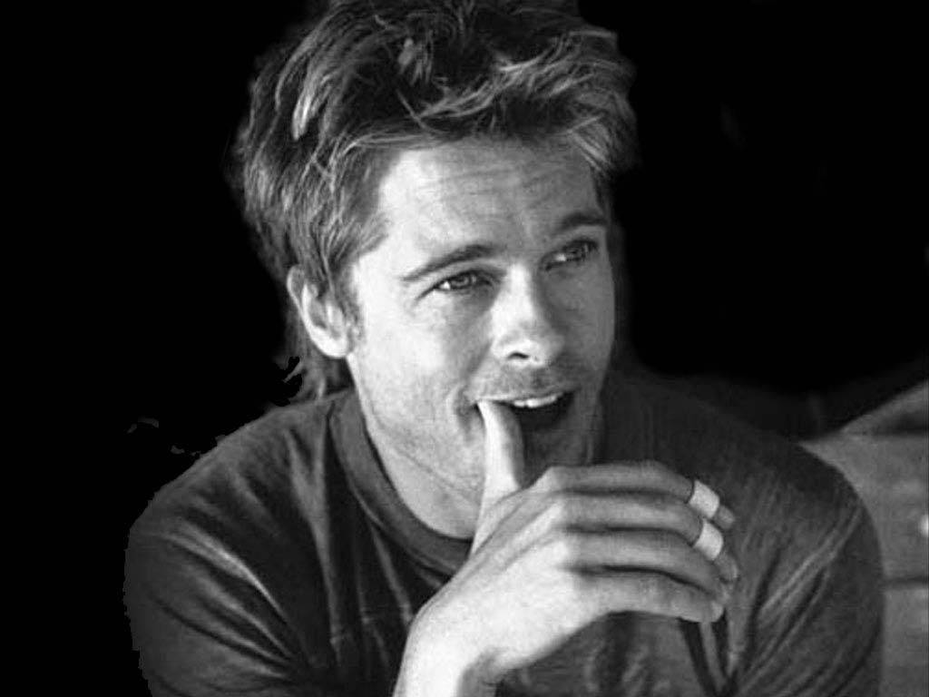 Brad Pitt In An Intense Grayscale Moment Background