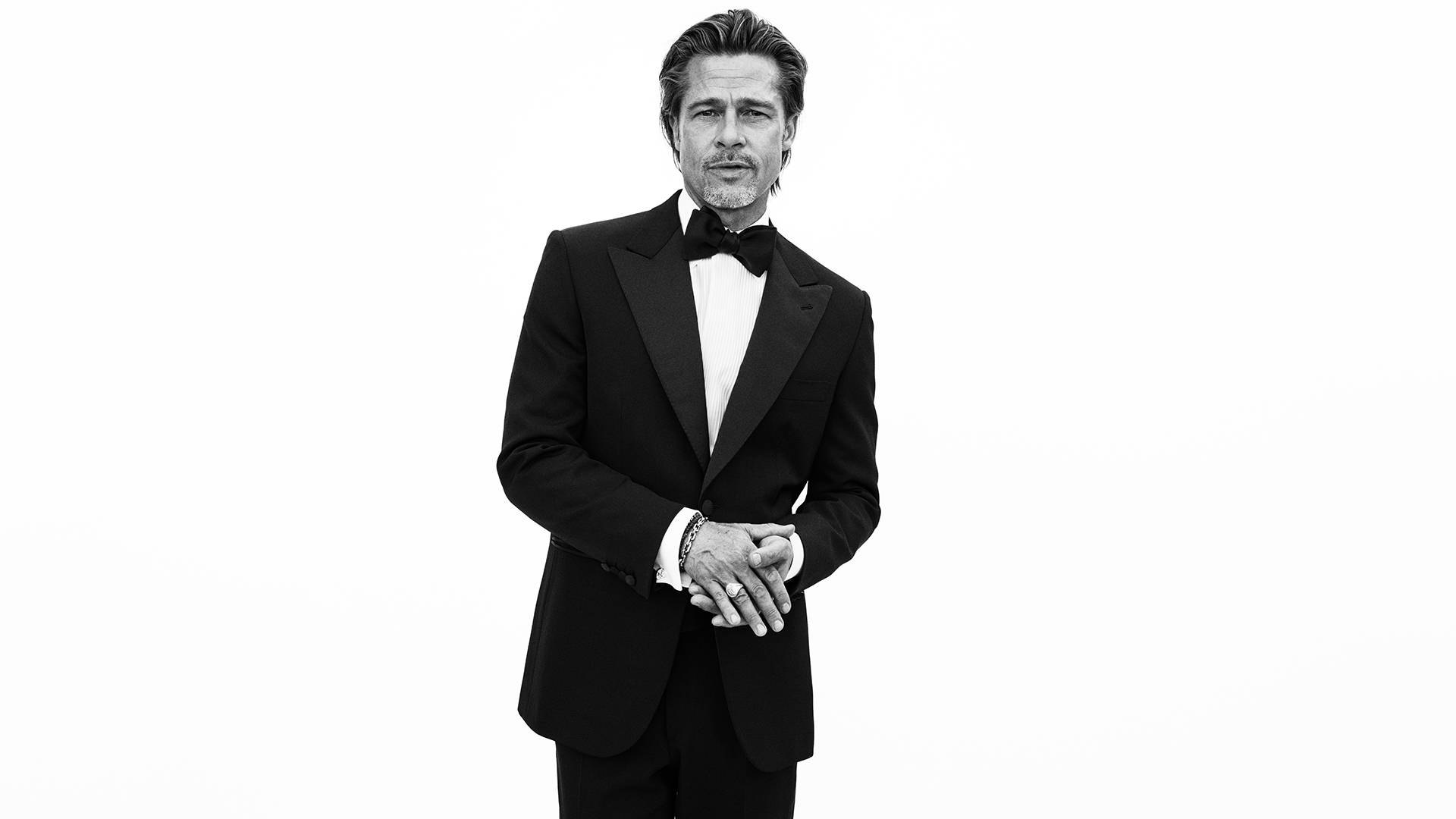 Brad Pitt Wearing A Brioni Suit And Tie