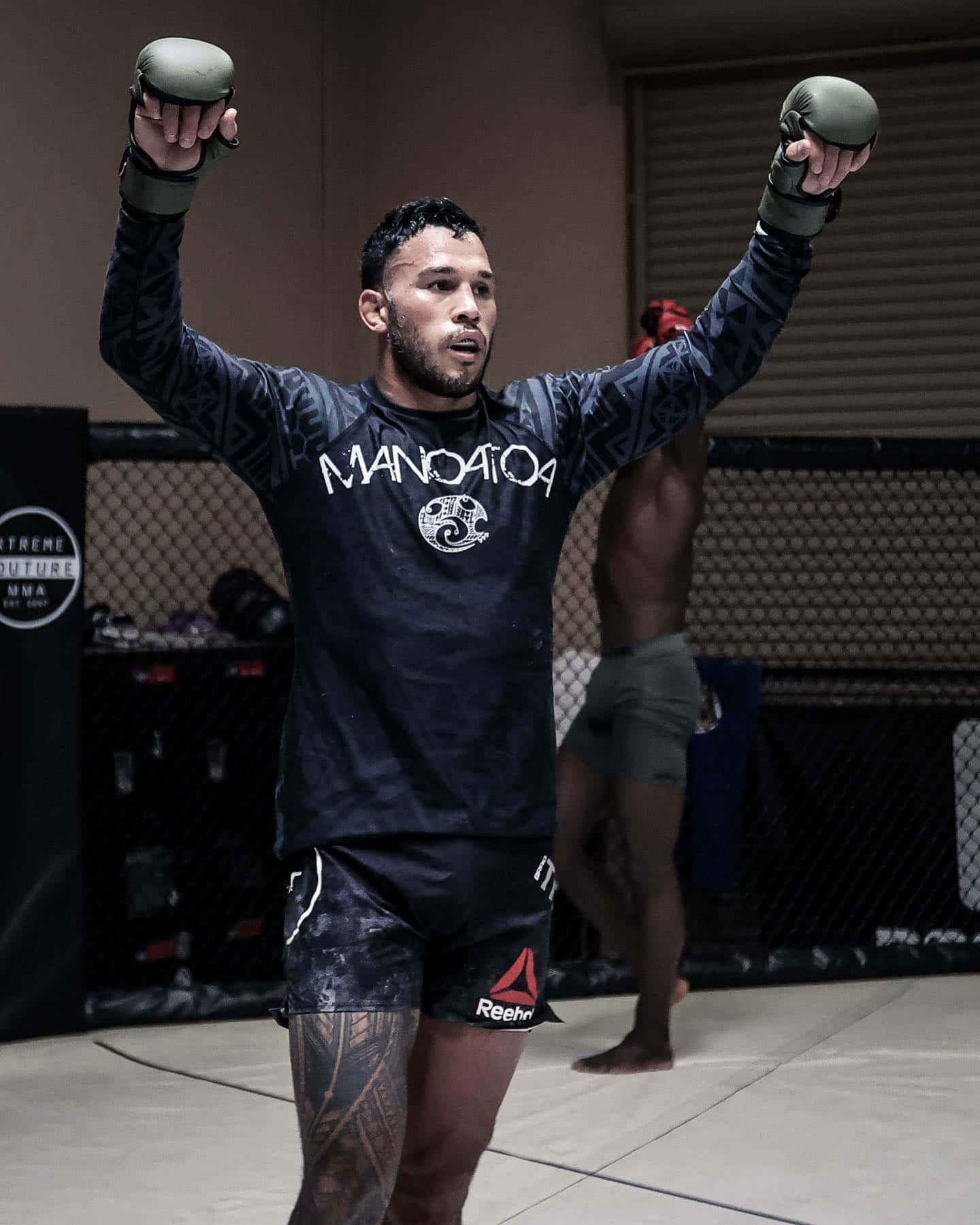 Brad Tavares Hands Up Background
