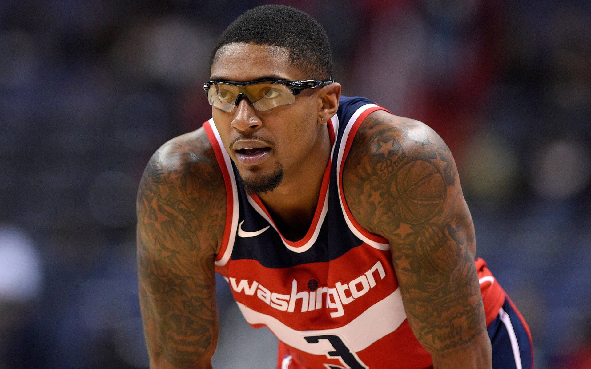 Bradley Beal Black And Yellow Glasses Background