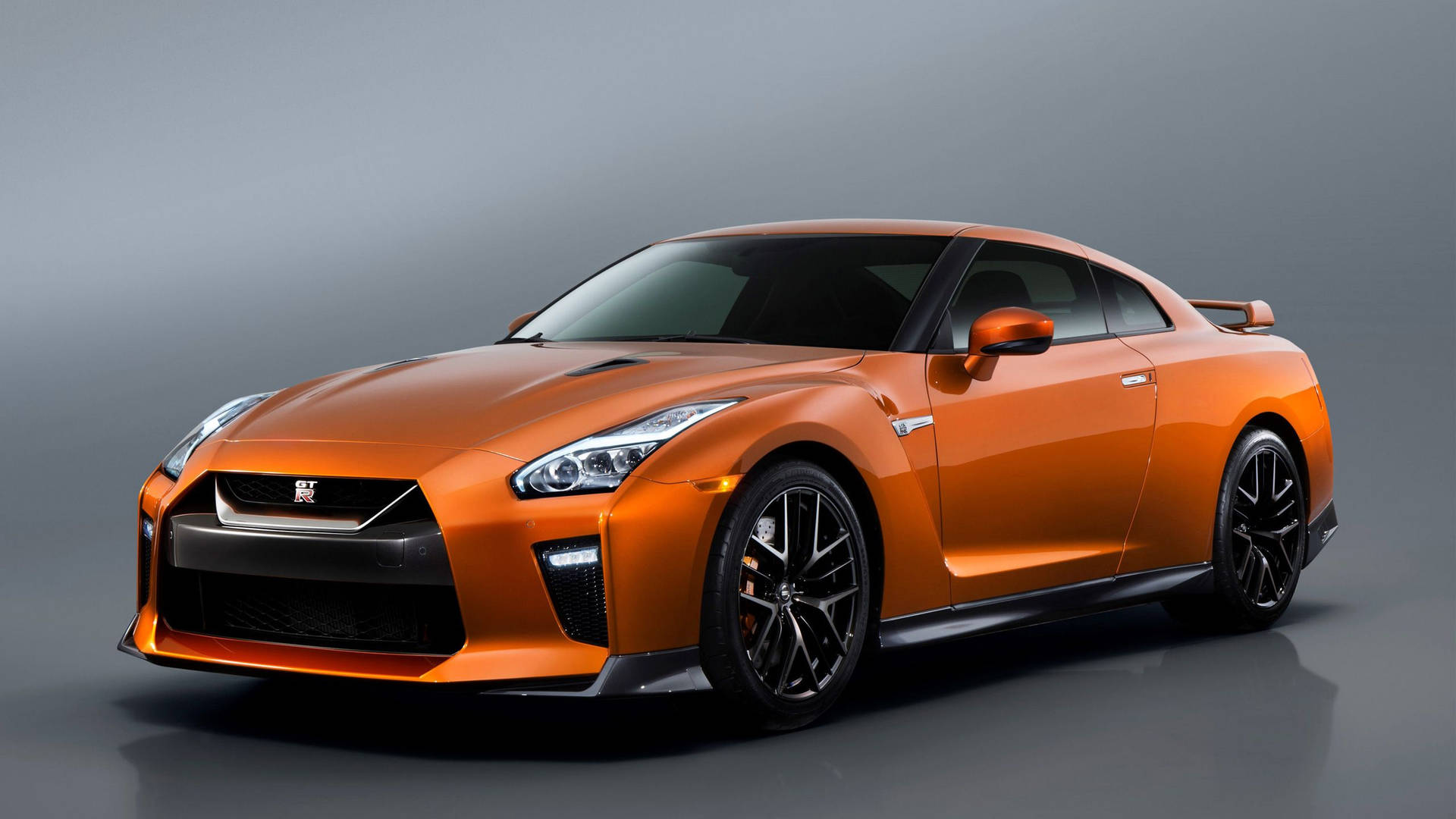 Brand New Orange Nissan Gtr Car Background