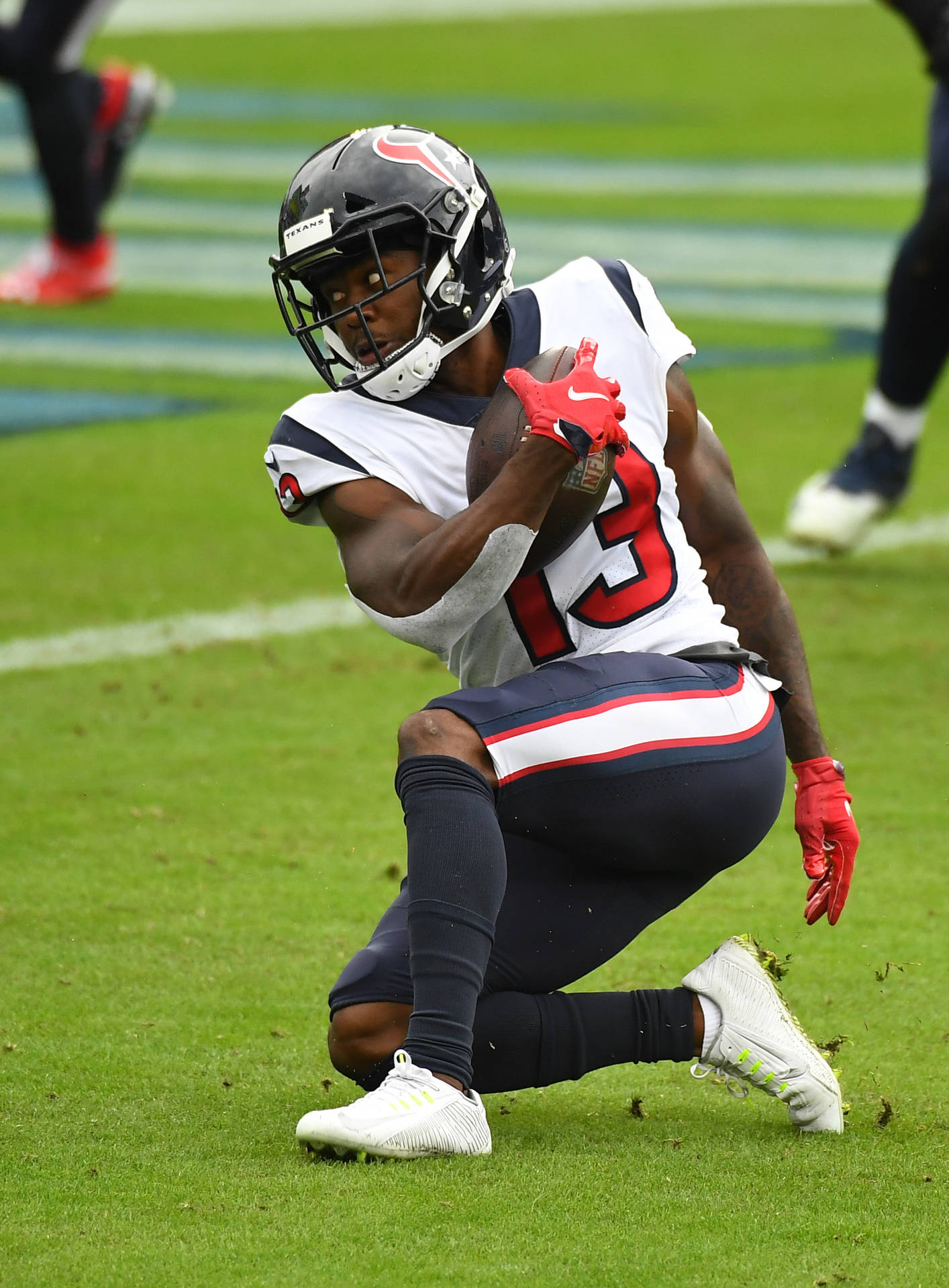 Brandin Cooks Kneeling With One Knee Background