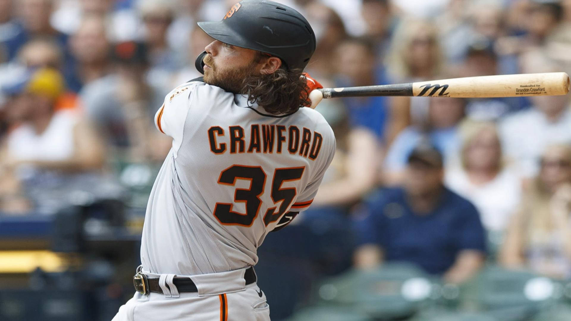 Brandon Crawford Holding A Bat Background