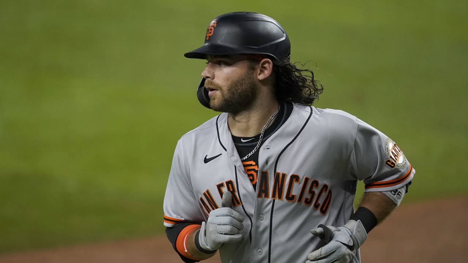 Brandon Crawford Running During A Game Background