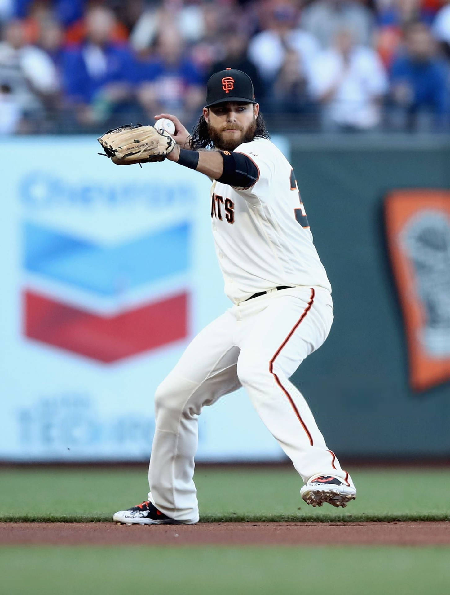 Brandon Crawford Throwing A Ball Background