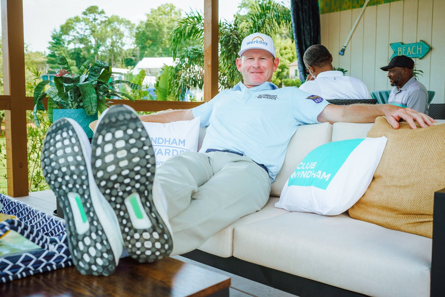 Brandt Snedeker Feet On Table Background