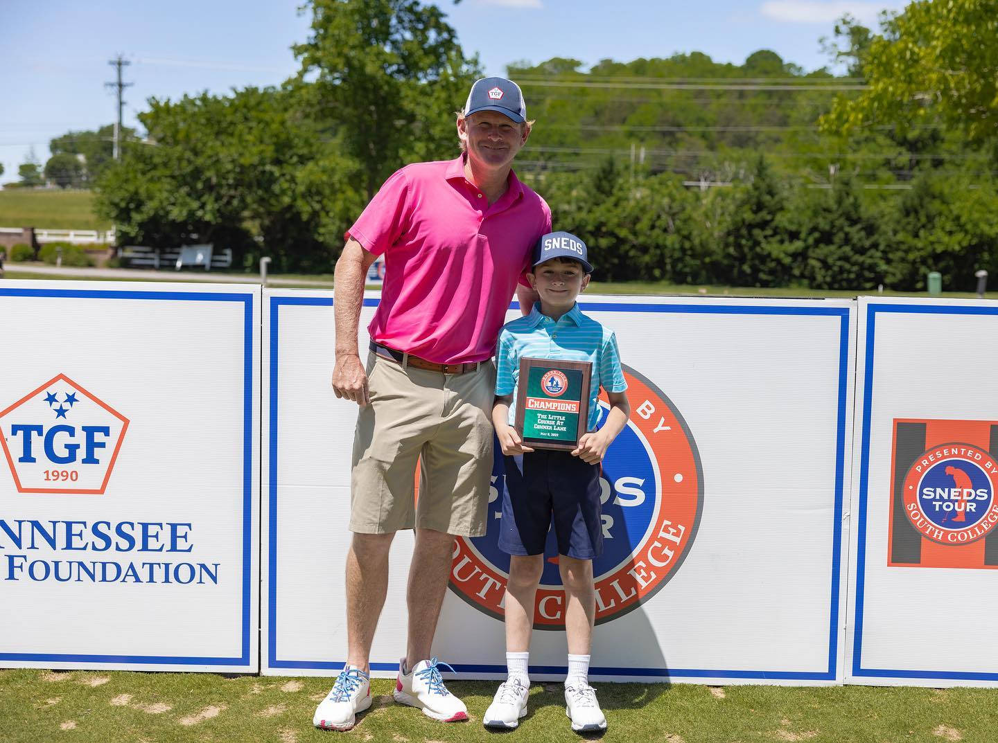 Brandt Snedeker Posing With Son Background