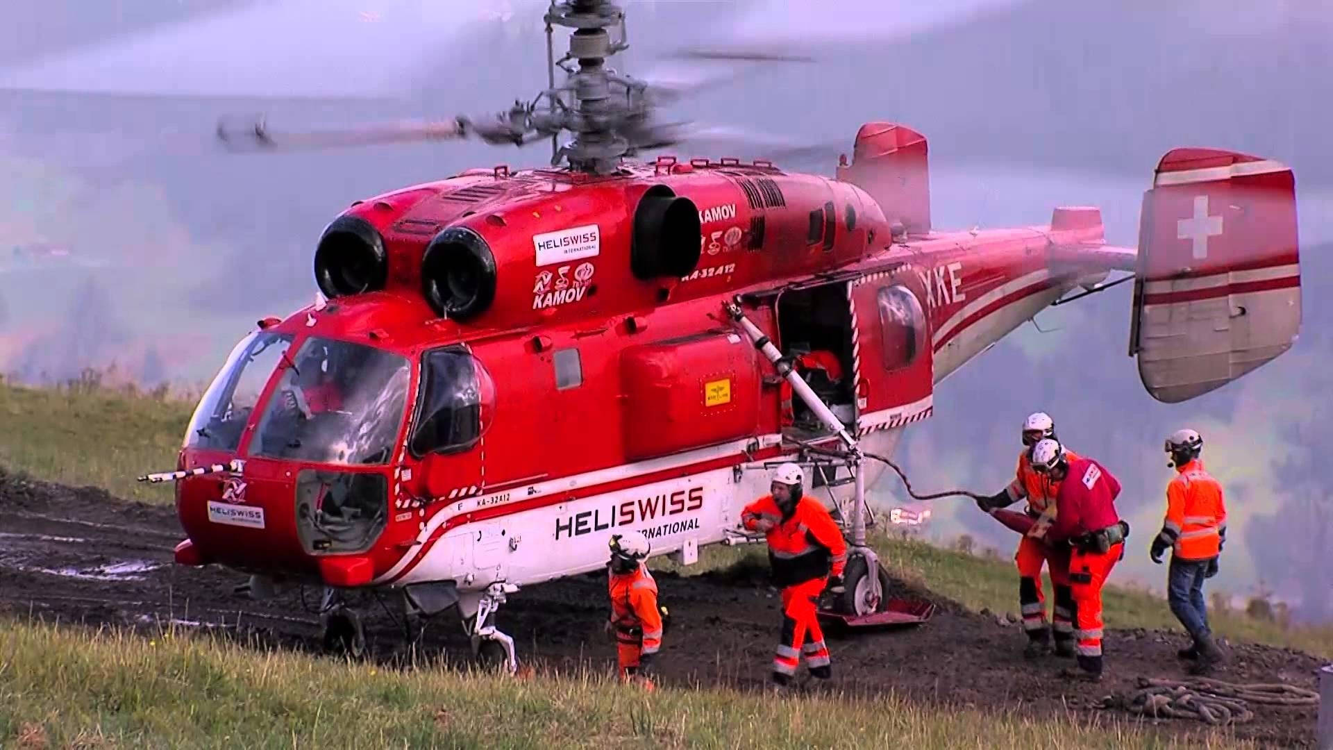 Brave Firefighters With Helicopter In Action