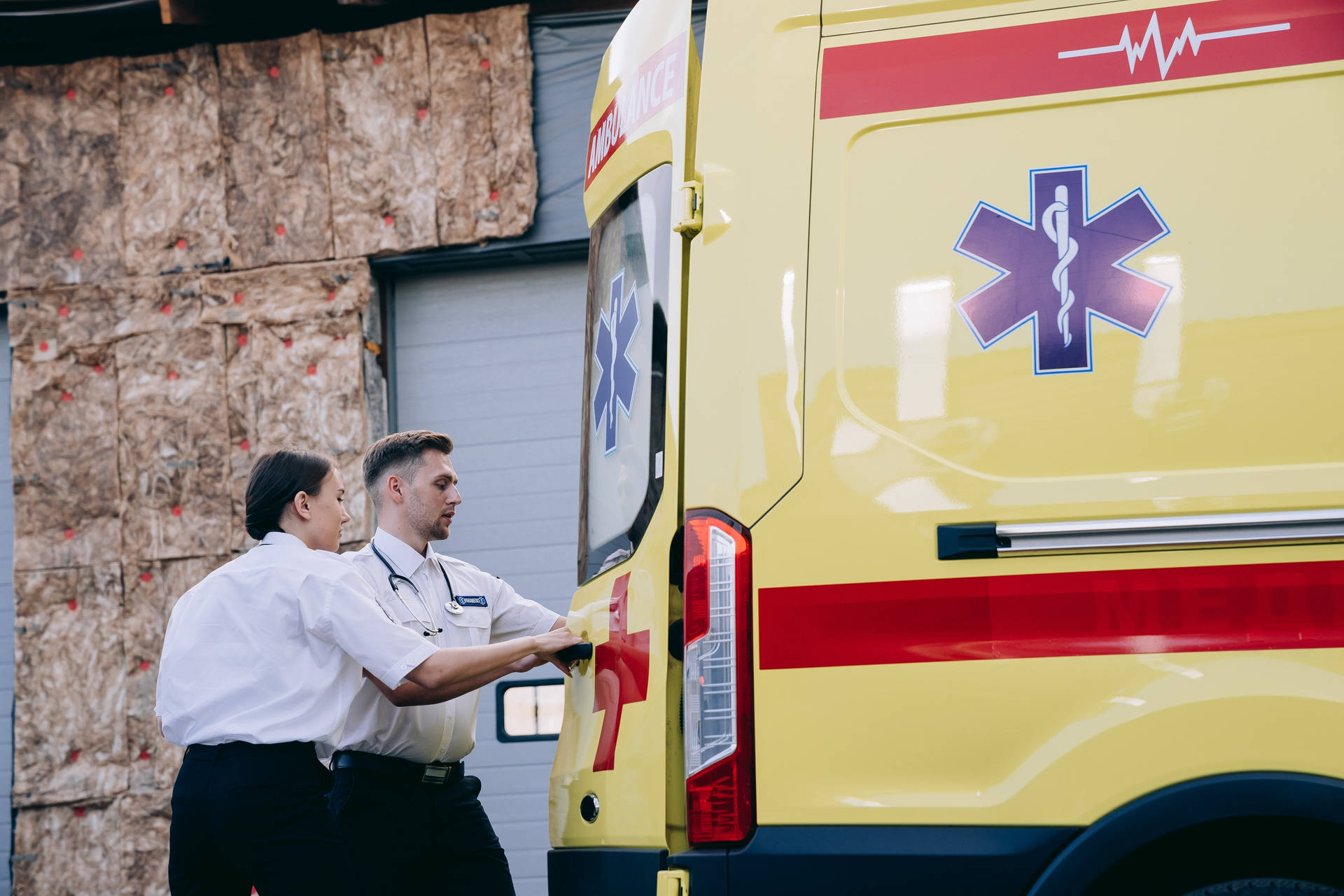 Brave Paramedics Ready For Duty Background