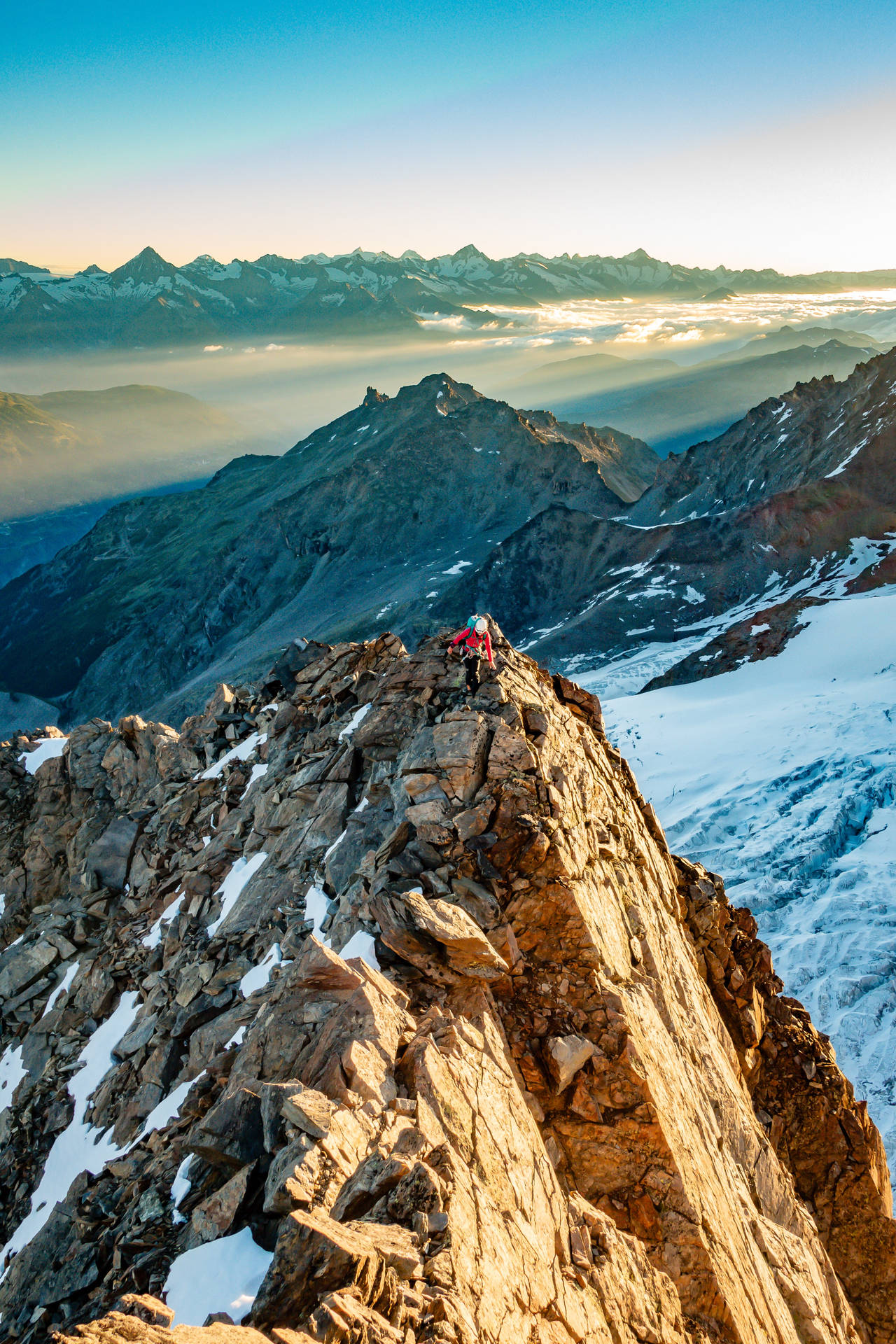 Bravely Exploring The Peaks Of The World Background