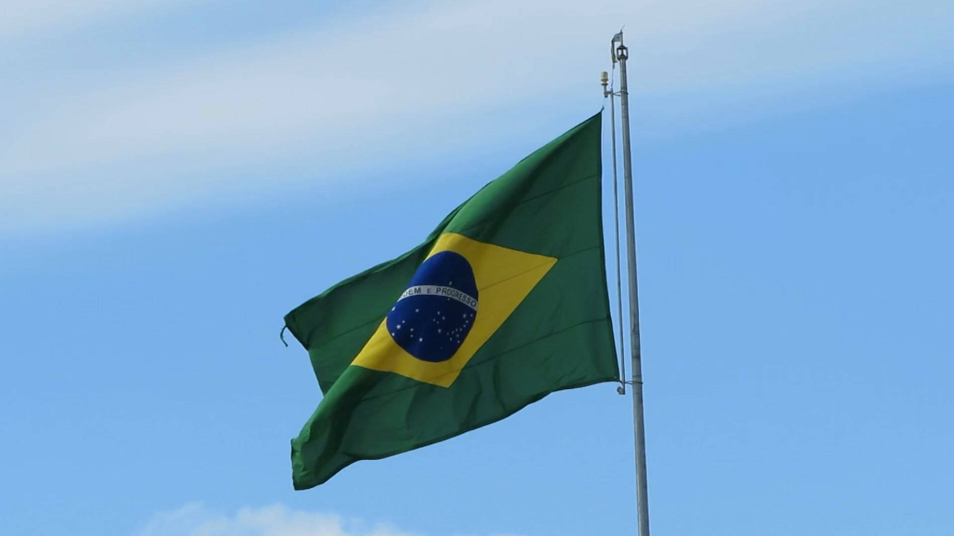 Brazil Flag In Flag Pole Background