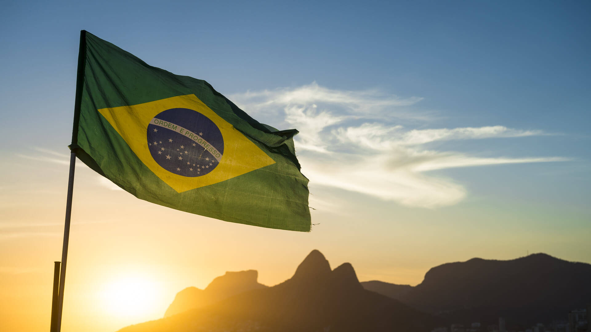 Brazil Flag In Sunrise