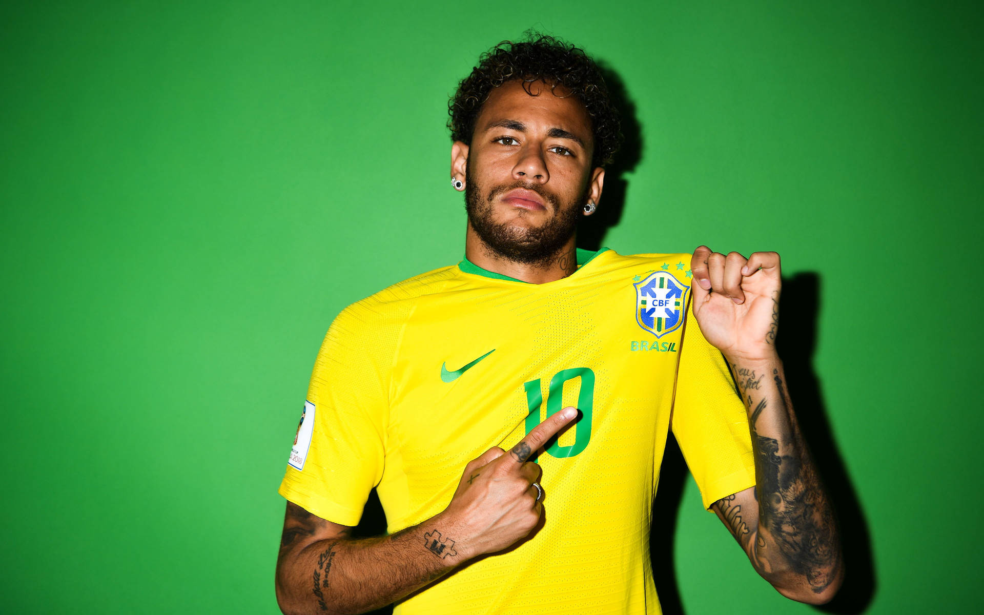 Brazil National Football Team Neymar Flexing Jersey Background