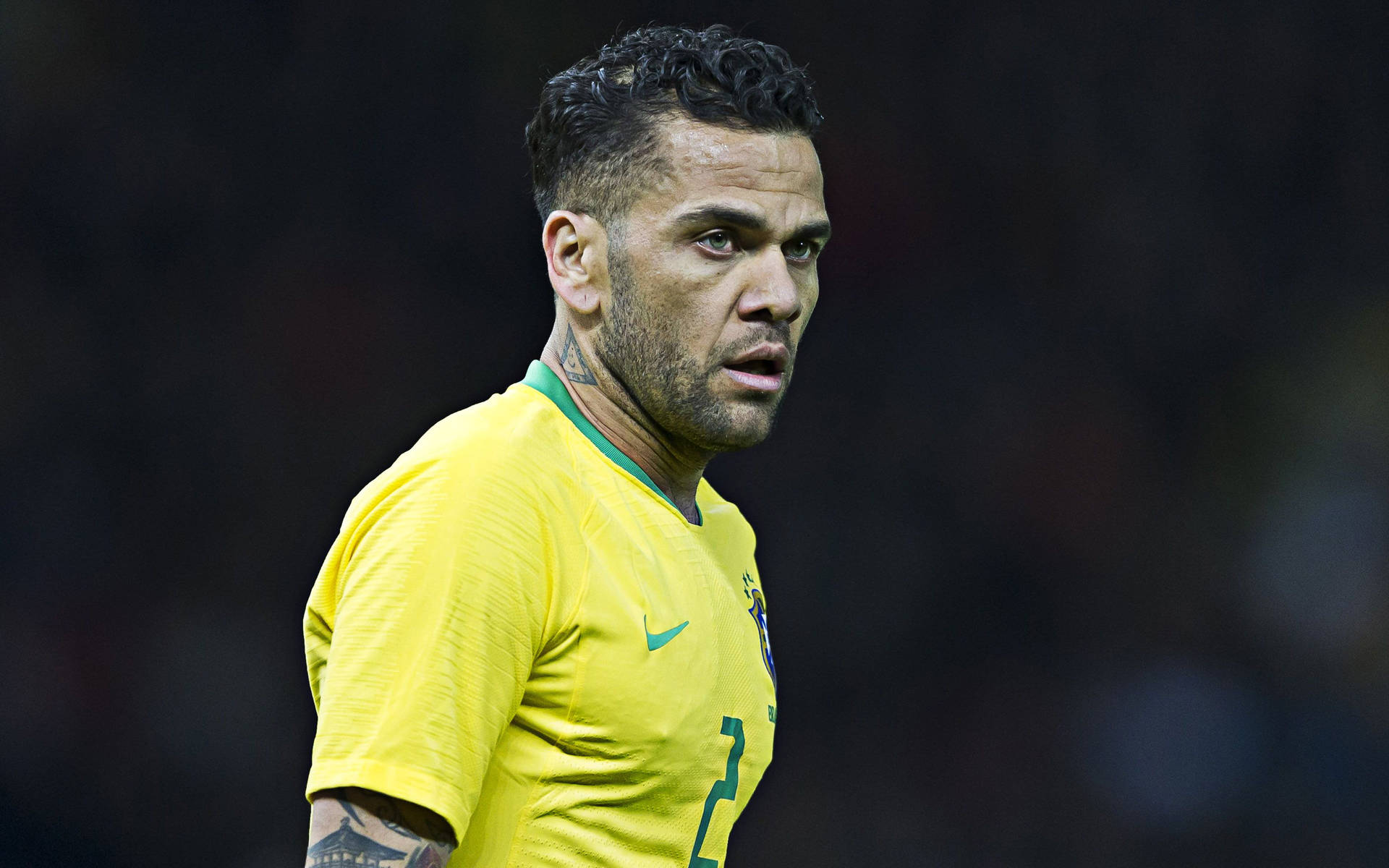 Brazil National Football Team Star - Dani Alves In Action Background