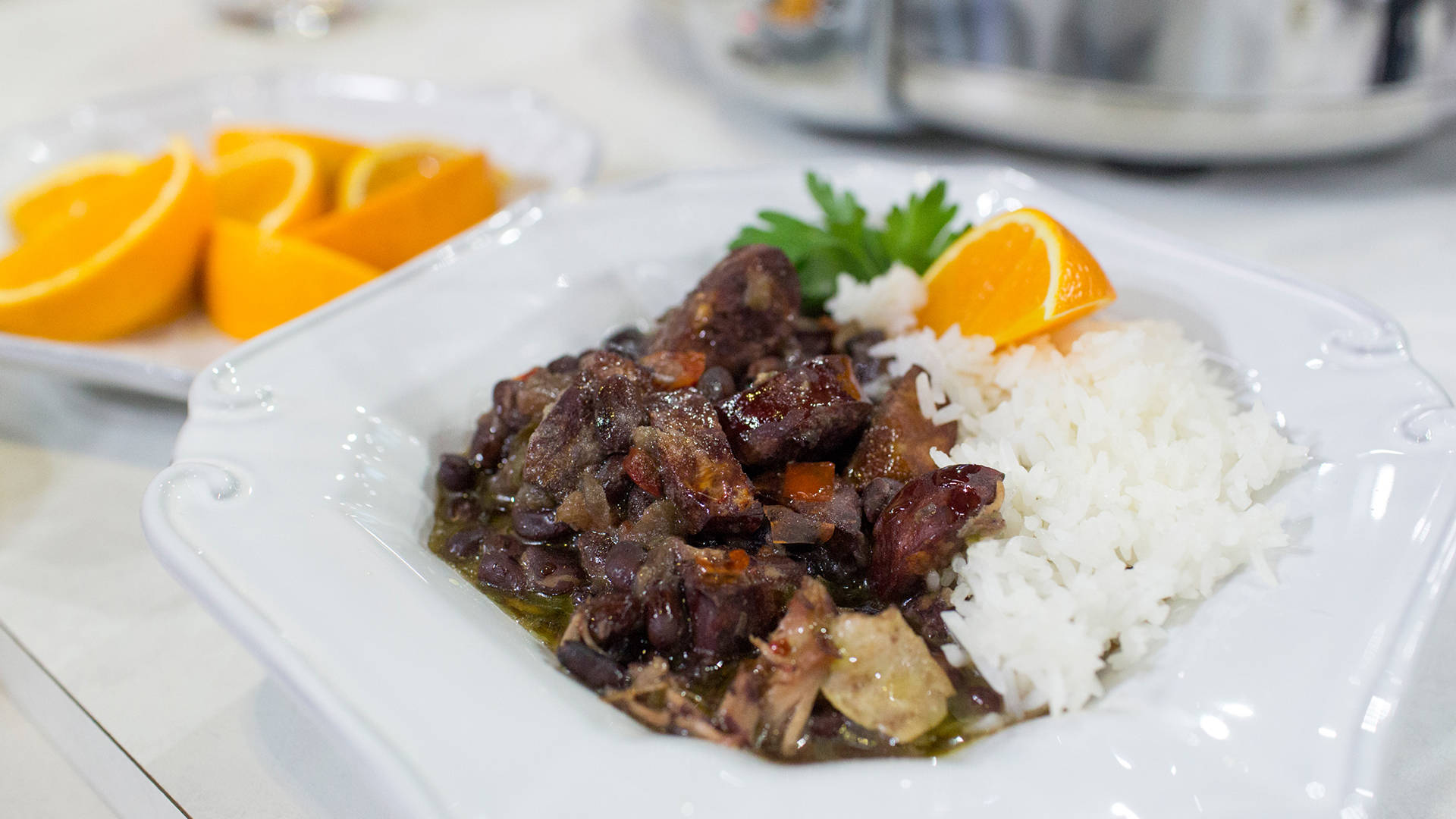 Brazilian Black Bean Stew Feijoada With Orange Background