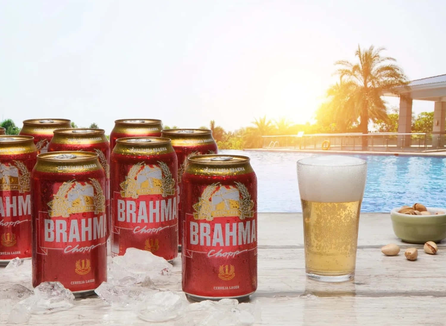 Brazilian Brahma Chopp Beer Cans At Poolside Background