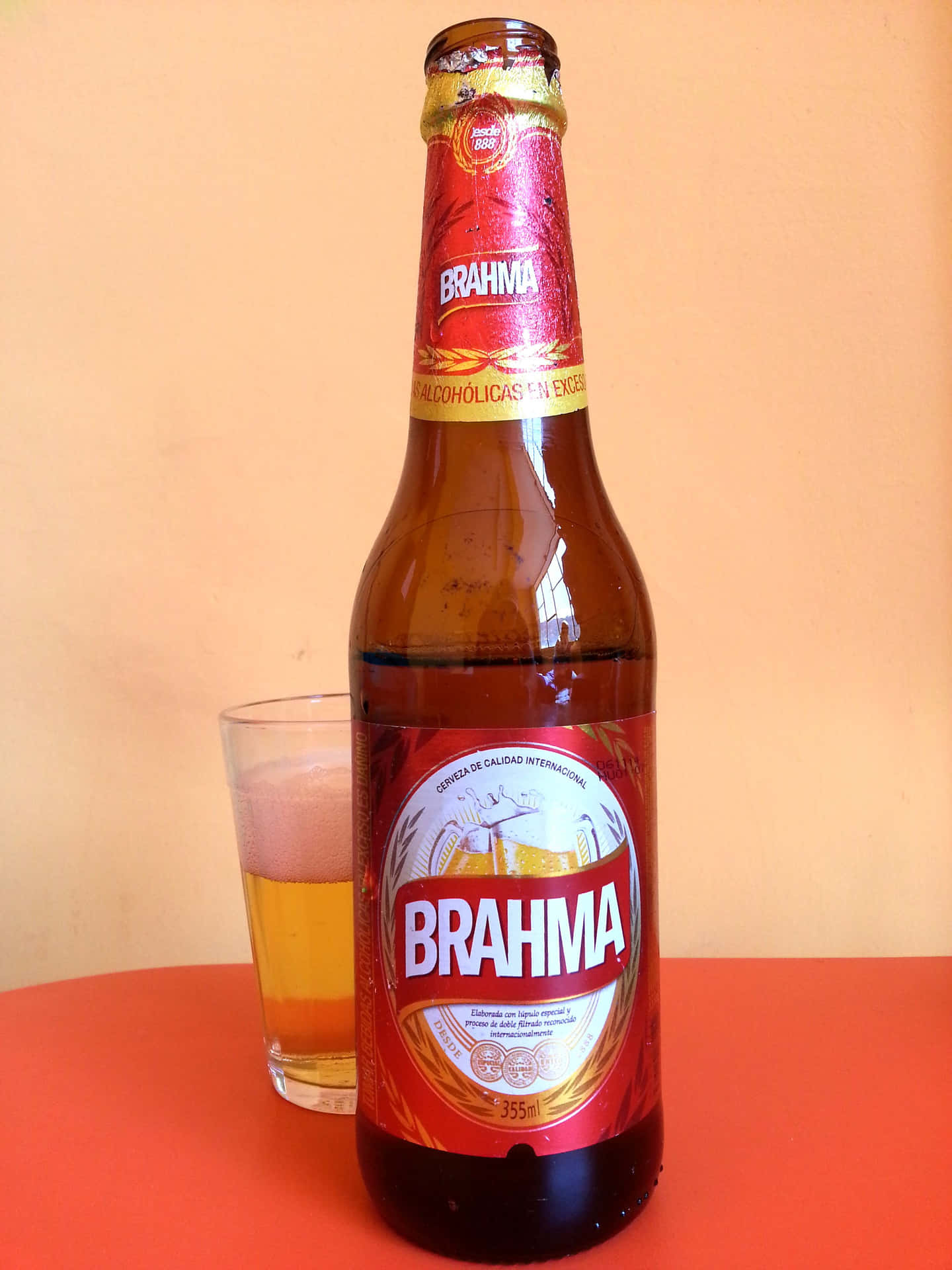 Brazilian Brahma Pilsen Beer With Glass Background