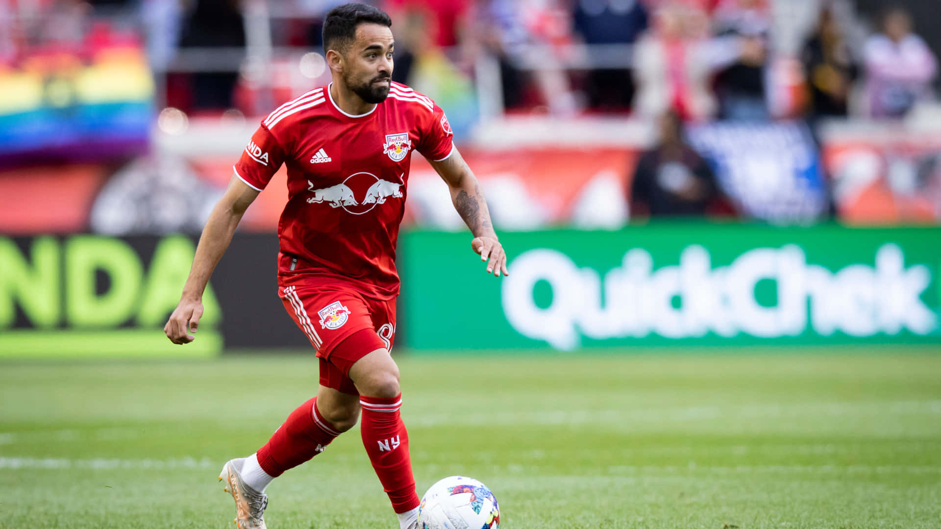 Brazilian Footballer Luquinhas In A Match At Red Bull Arena Background